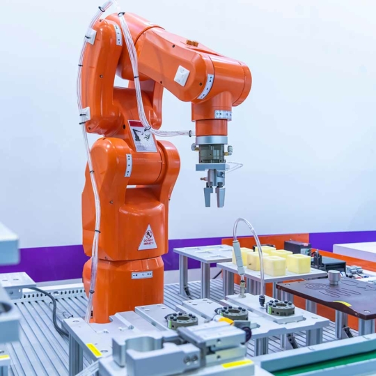 Automation Computers Control Robotic Arms In Smary Manufacturing